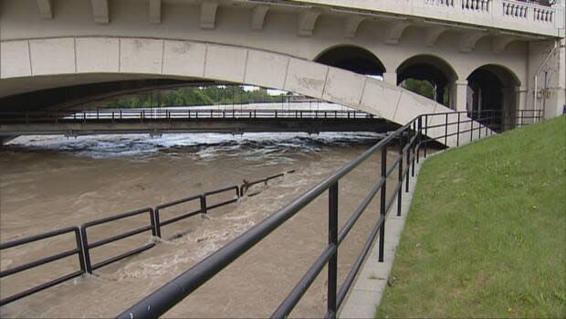 A flooded pathway that passes underneath Calgary's Centre Street Bridge is seen in this file photo from June 2013. (CBC - image credit)