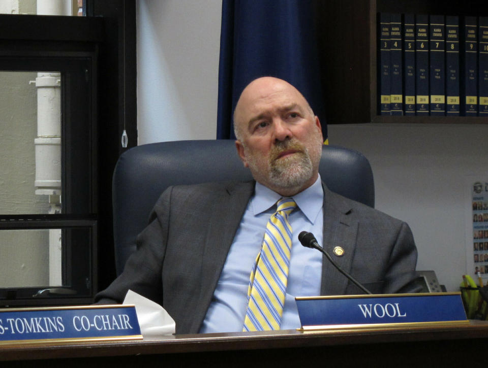 FILE - Alaska state Rep. Adam Wool, listens to testimony given by phone on the nomination of Amanda Price to be state Public Safety commissioner on Thursday, April 11, 2019, in Juneau, Alaska. Voters are facing an unusual election, with 48 candidates running to succeed the man who held the state's only U.S. House seat for 49 years. While some of the candidates in the June 11 special primary have name recognition, many are relative unknowns or political novices. (AP Photo/Becky Bohrer, File)