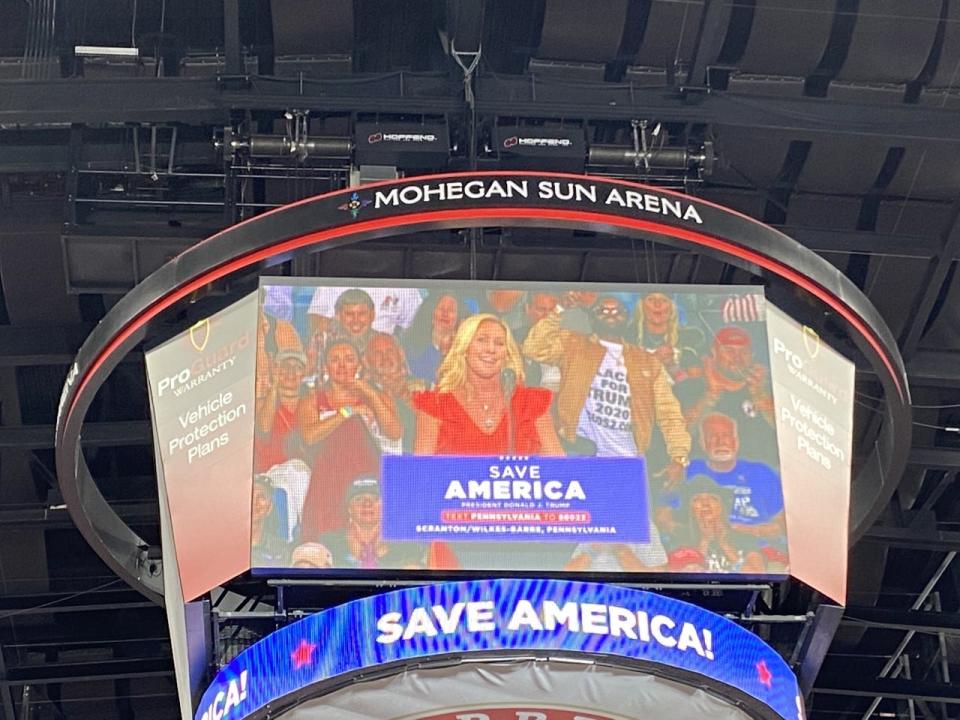 Marjorie Taylor Greene made a surprise guest appearance at Mohegan Sun Arena Saturday, lambasting green energy initiatives such as windmills in PA, and sympathizing with men imprisoned for their actions at the Capitol Riot.