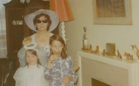 Genevieve (above left) with her sister, Cathleen, and mother, Thelma