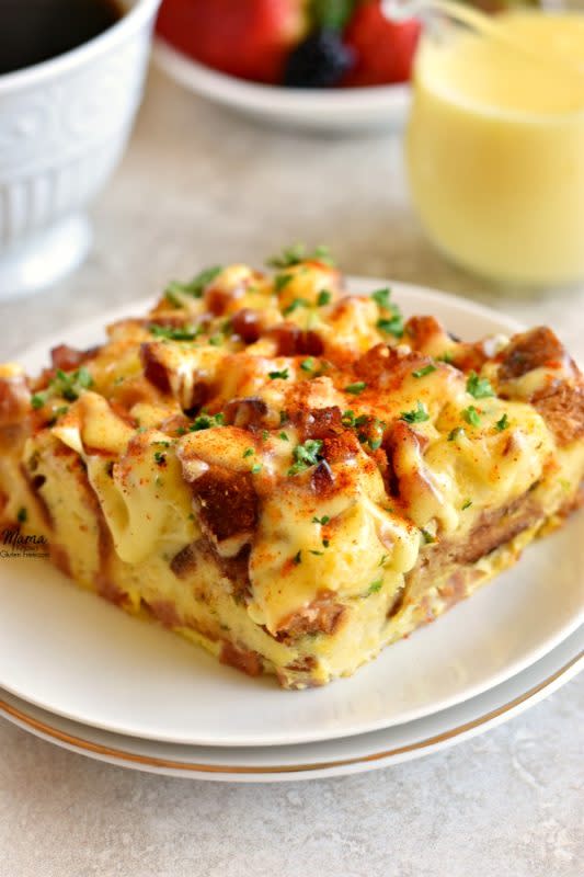 <p>Mama Knows Gluten Free</p><p>All of the flavors you love from the classic brunch dish in an easy overnight breakfast casserole loaded with toasted gluten-free bread, Canadian bacon, and eggs then smothered in a rich and creamy Hollandaise Sauce.</p><p><strong>Get the recipe: <a href="https://www.mamaknowsglutenfree.com/eggs-benedict-casserole-gluten-free/" rel="nofollow noopener" target="_blank" data-ylk="slk:Gluten-Free Eggs Benedict Casserole;elm:context_link;itc:0;sec:content-canvas" class="link ">Gluten-Free Eggs Benedict Casserole</a></strong></p>