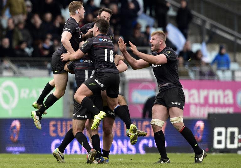 Saracens' players celebrate their victory on April 5, 2015 in Colombes, outside Paris