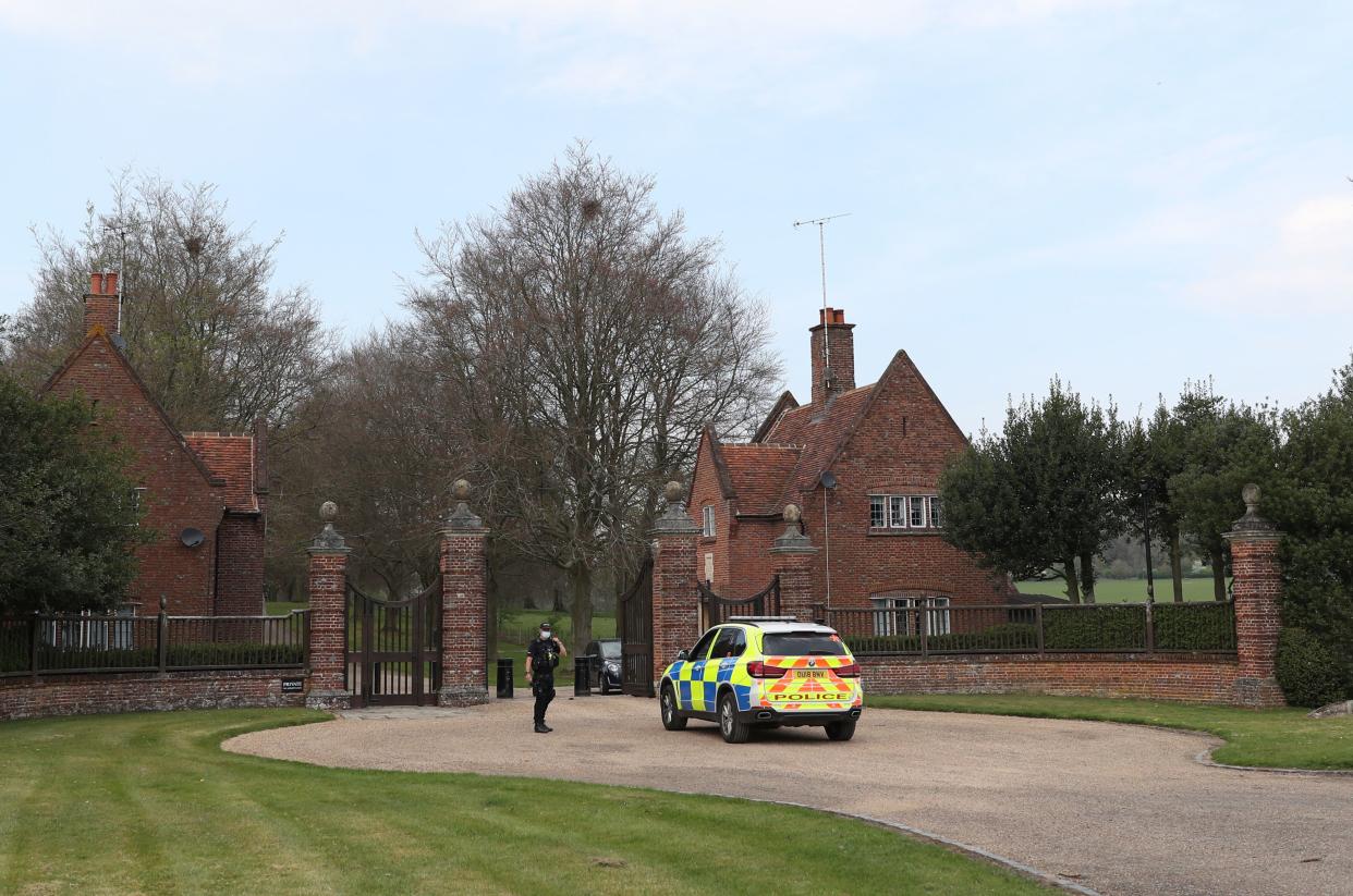 Police wait outside Chequers, the country residence of Britain's Prime Minister, on April 12, 2020, in Aylesbury, England. British Prime Minister Boris Johnson was discharged from hospital today a week after being admitted for treatment for coronavirus, COVID-19 and spending three days in intensive care. A spokesman said that "on the advice of his medical team, the PM will not be immediately returning to work" and will now head to his official country residence to rest and recuperate.