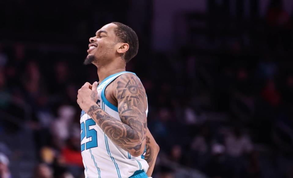 Charlotte Hornets forward P.J. Washington (25) smiles as he runs up the court against the Atlanta Hawks at the Spectrum Center in Charlotte, N.C., on Monday, February 13, 2023.