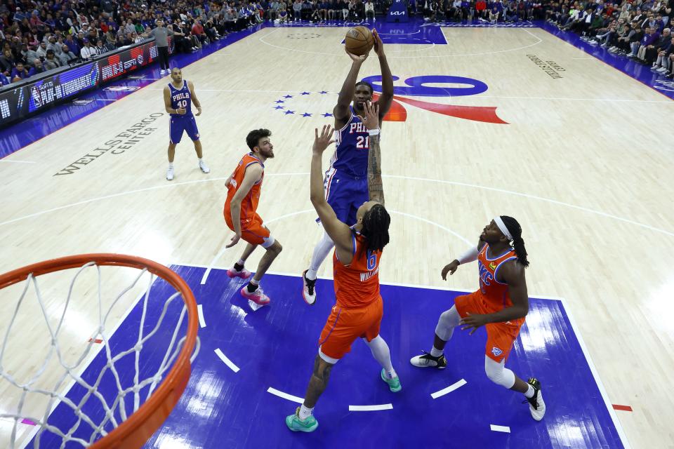 Philadelphia's Joel Embiid (21) shoots over OKC's Jaylin Williams (6) during the fourth quarter of the 76ers' 109-105 win Tuesday night at the Wells Fargo Center.