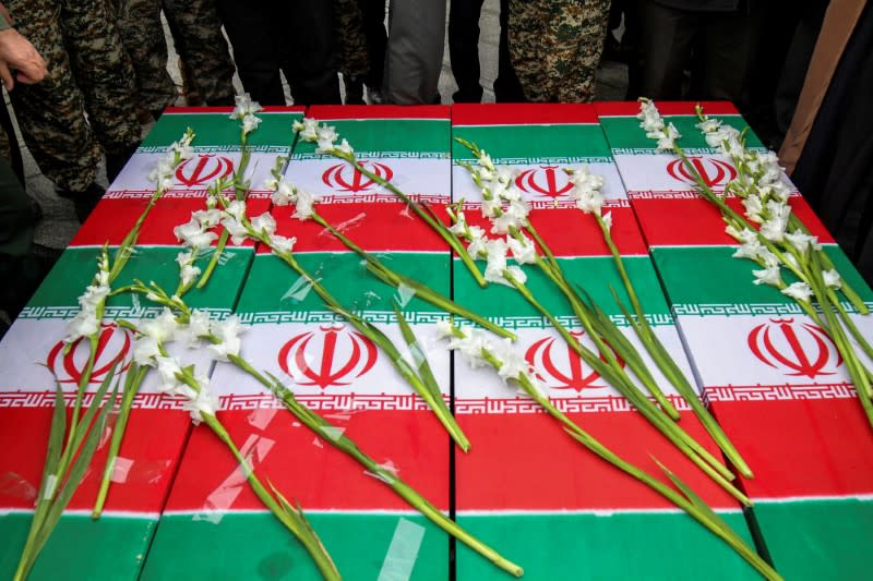 FILE PHOTO: The coffins of the four Iranian victims of the Ukrainian plane crash in Iran, are seen during their funeral ceremony in Hamadan