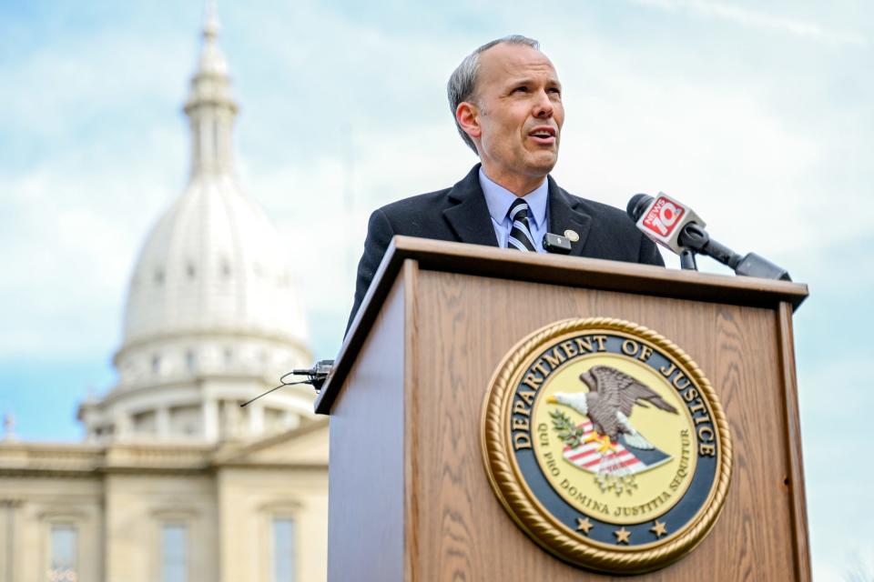 U.S. Attorney for the Western District of Michigan Mark Totten speaks during a press conference to announce charges in a public corruption scheme on Thursday, April 6, 2023, outside the Charles E. Chamberlin Federal Building in Lansing.