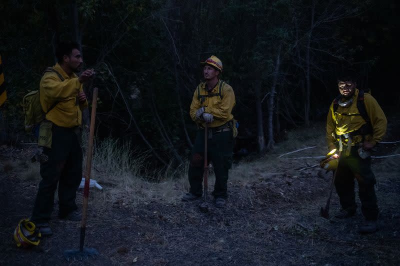 The Wider Image: Oregon inmates find redemption in fighting wildfires