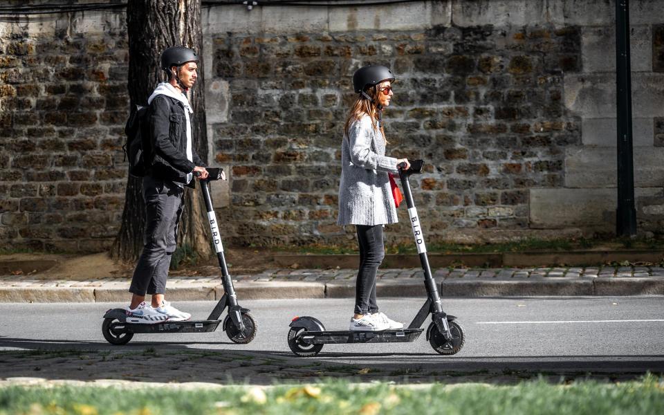 People on electric scooters - Bird