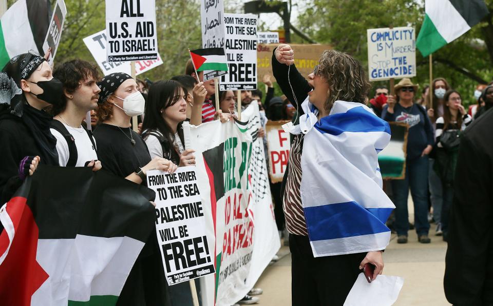 A supporter of Israel yells to supporters of Palestinians during a protest of the Israel-Hamas war at Iowa State University’s central campus on Wednesday, May 1, 2024, in Ames, Iowa.