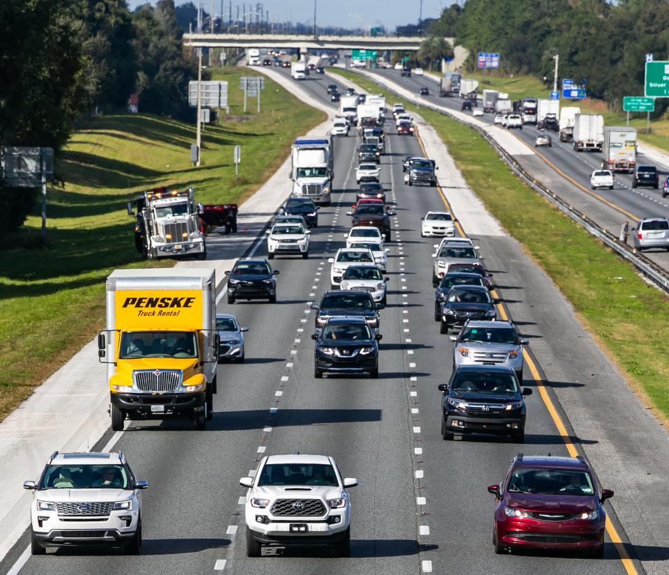 Traffic makes its way south on Interstate 75, just north of the Southwest 66th Street overpass on Tuesday. AAA predicts 13% more travelers this year compared to Thanksgiving 2020. [Doug Engle/Ocala Star-Banner]2021