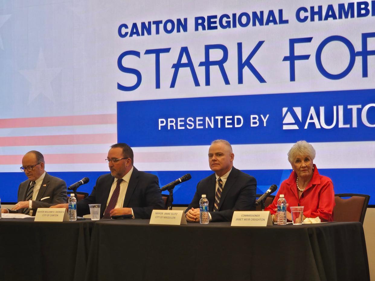 Alliance Mayor Andrew Grove, from left, Canton Mayor William V. Sherer II, Massillon Mayor Jamie Slutz and Stark County Commissioner Janet Weir Creighton participated in the Canton Regional Chamber of Commerce's Stark Forum on Friday at the Pro Football Hall of Fame.