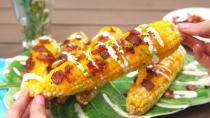 <p>It's not the vegetable itself that's fattening. One ear of corn has less than eight grams. But when you rub it down with butter, and top it with creamy dressings, you send the fat content into the danger zone. </p>