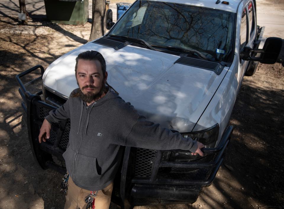 Ryan Sivley poses for a portrait with his 2010 Chevrolet Silverado Tuesday, Feb. 23, 2021 in Austin, Texas. Sivley used his truck and a 4x4 SUV to help 500 stranded motorists during February&#x002019;s winter storm that brought freezing temperatures, sleet and snow. 