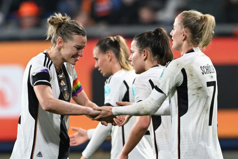 Germany's Lea Schueller (R) celebrates scoring her side's second goal with teammate Alexandra Popp during the UEFA Women's Nations League A play-off round soccer match for 3rd place between Netherlands and Germany Abe Lenstra Stadium. Federico Gambarini/dpa