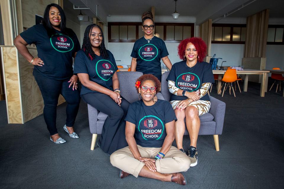 From left: The 1619 Freedom School leadership team Joy Briscoe, Sheritta Stokes, Lori Dale, Sharina Sallis and Nikole Hannah-Jones pose for a photo. Joy Harrington is not pictured.