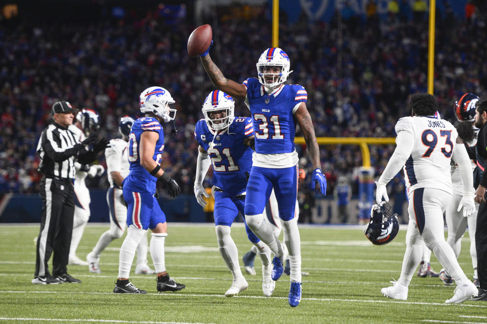 Buffalo Bills' Rasul Douglas, center, celebrates after recovering a fumble during the second half of an NFL football game against the Denver Broncos, Monday, Nov. 13, 2023, in Orchard Park, N.Y. (AP Photo/Adrian Kraus)