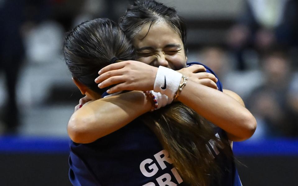 Emma Raducanu embraces GB team captain Anne Keothavong