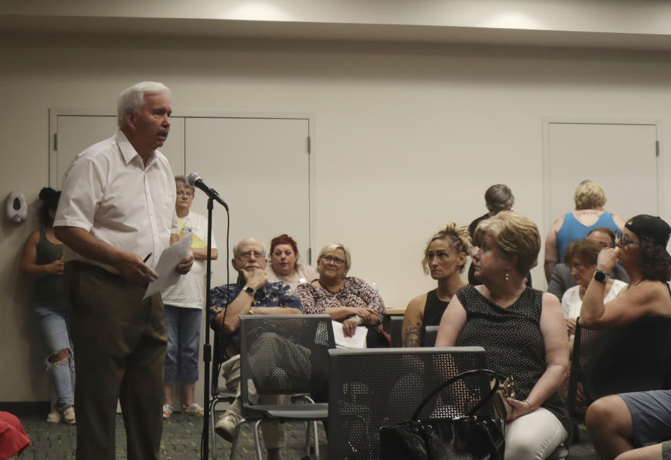 Phil Chatting, a worker at the anti-abortion crisis pregnancy center Woman's Choice Pregnancy Resource Center speaks against a proposal from the long-time abortion provider Women's Health Center of West Virginia to add a syringe service its offerings during a public hearing at the Goodwill Prosperity Center in Charleston, W.Va., on Thursday, July 27, 2023. (AP Photo/Leah Willingham)