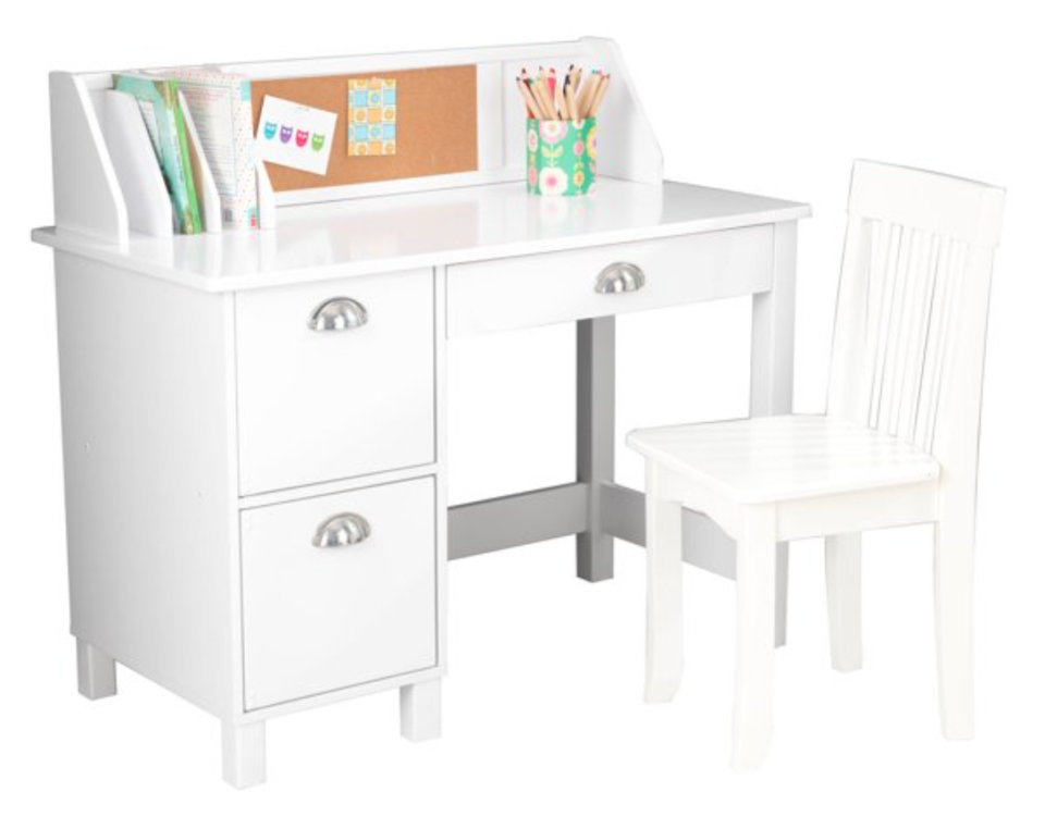 Small white desk with 3 drawers, matching chair, and bulletin board backer. 