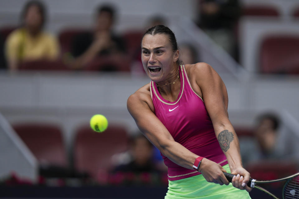 Aryna Sabalenka of Belarus prepares to hit a return shot against Katie Boulter of Great Britain during the 2nd round in the women's singles match of the China Open tennis tournament at the Diamond Court in Beijing, Tuesday, Oct. 3, 2023. (AP Photo/Andy Wong)