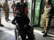 A medical worker transports a wounded in a hospital during shelling by Azerbaijan's artillery in Stepanakert, the separatist region of Nagorno-Karabakh, Wednesday, Oct. 28, 2020. Nagorno-Karabakh officials said Azerbaijani forces hit Stepanakert, the region's capital, and the nearby town of Shushi with the Smerch long-range multiple rocket systems, killing one civilian and wounding two more. (AP Photo)