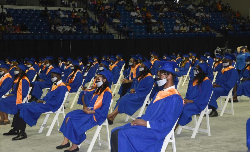 Rain forced a change of location for graduates of Sol C. Johnson to Tiger Arena at Savannah State University.