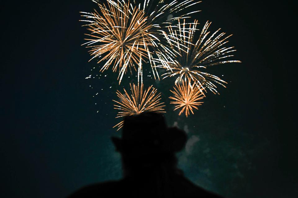 A firework explodes in the air at Clemson MBA Fireworks on the Fourth at Unity Park after a weather warning delayed the celebration in Greenville, SC, on Tuesday, July 4, 2023. The fireworks ended abruptly due to a malfunction caused by heavy rainfall. 