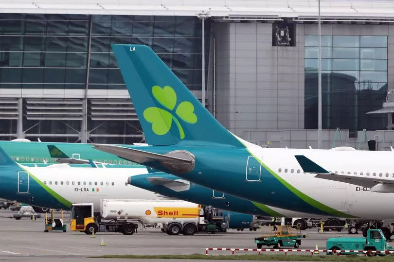 Aer Lingus is set to cut 10-20% of flights as industrial action continues in a dispute over pay (Niall Carson/PA)