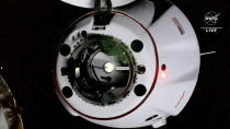 In this image from video made available by NASA, a SpaceX Crew Dragon capsule approaches the International Space Station on Thursday, Oct. 6, 2022. The crew of four includes the first Russian to launch from the U.S., in 20 years and the first Native American woman to orbit the Earth. (NASA via AP)