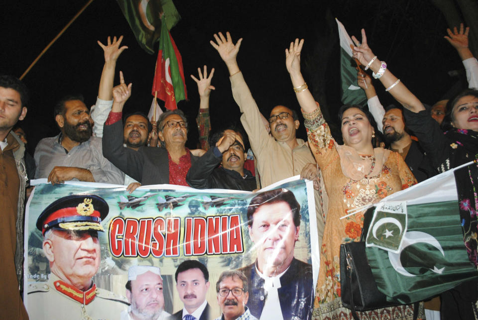 Pakistani protesters shout anti-Indian slogans in Hyderabad, Pakistan, Tuesday, Feb. 26, 2019. Pakistan said India launched an airstrike on its territory early Tuesday that caused no casualties, while India said it targeted a terrorist training camp in a pre-emptive strike that killed a "very large number" of militants. (AP Photo/Pervez Masih)