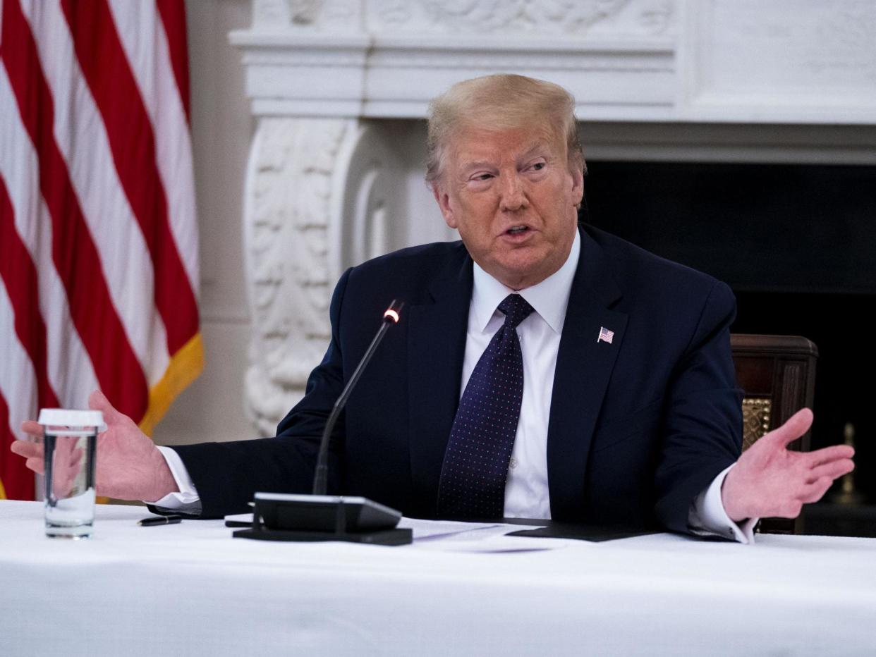 President Donald Trump makes remarks as he participates in a roundtable with law enforcement officials in the State Dining Room of the White House: (2020 Getty Images)