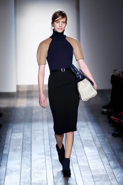 <b>Victoria Beckham AW13 at New York Fashion Week </b><br><br>Victoria's designs featured modern, puffball sleeves.<br><br>Image © Getty