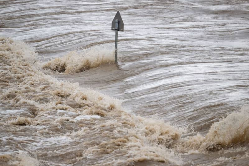 The Neckar River burst its banks near the historic old town of Heidelberg during a massive flood. Boris Roessler/dpa