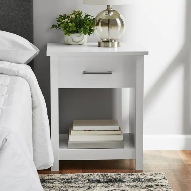 white nightstand with a drawerr