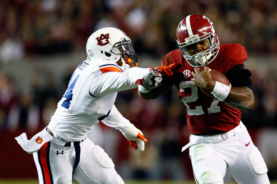 Derrick Henry is one of many Alabama alumni who had to survive the gauntlet of the Iron Bowl against Auburn.  (Kevin C. Cox/Getty Images)