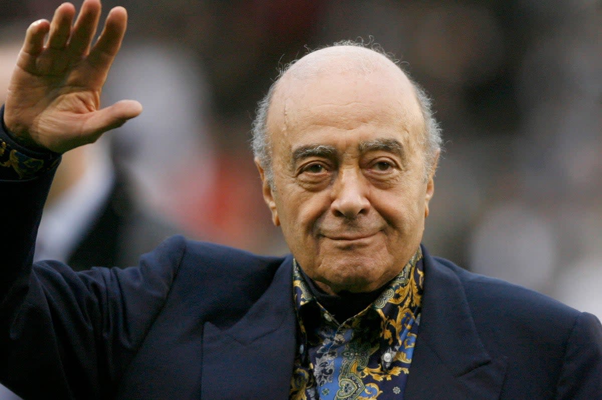 Then-Fulham owner Mohamed Al-Fayed waves to the crowd before a Premier League match against Tottenham at Craven Cottage stadium, London, in 2008  (AP)