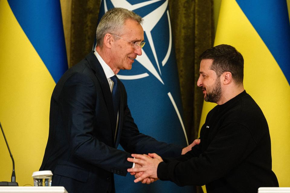 NATO head Jens Stoltenberg (L) shakes hands with Ukrainian President Volodymyr Zelenskyy at the end of a joint press conference in Kyiv, on April 20, 2023. Stoltenberg said the Western military alliance would "ensure that Ukraine prevails" against Russia but did not hold out any immediate prospect of NATO membership.