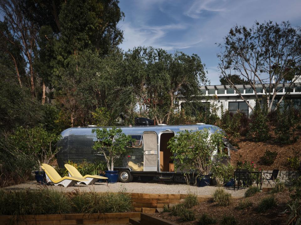 The renovated, retrofitted 1976 Airstream includes yellow fiberglass lounge chairs from the 1960s. “The Airstream is meant to be there forever,” says Naouri.