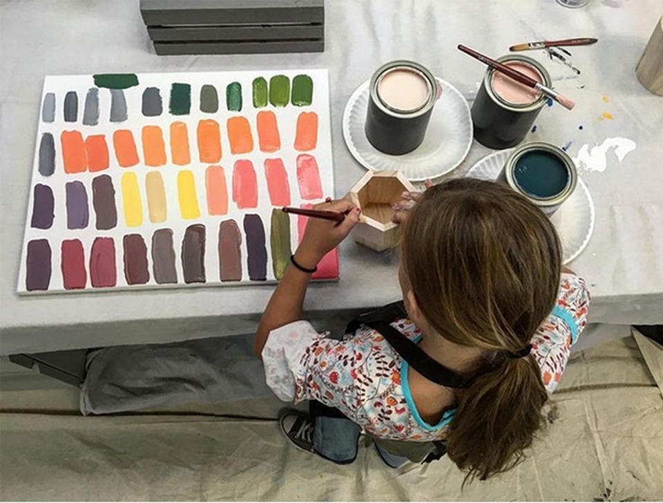 <p>Ella's creativity extends to paint projects, too! The couple's older daughter had fun mixing colors in a <a rel="nofollow noopener" href="https://www.instagram.com/p/BMaFzs6g6wt/" target="_blank" data-ylk="slk:November 2016 photo;elm:context_link;itc:0;sec:content-canvas" class="link ">November 2016 photo</a>. "She created all of these colors from scratch today! My little design bud at work ???? <a rel="nofollow noopener" href="https://www.instagram.com/explore/tags/teamella/" target="_blank" data-ylk="slk:#teamella;elm:context_link;itc:0;sec:content-canvas" class="link ">#teamella</a>," Joanna wrote.</p>