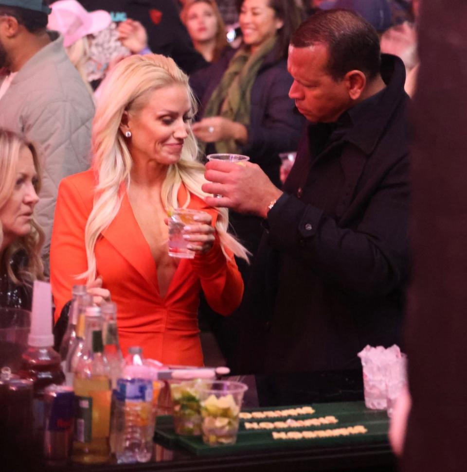 Scottsdale, AZ - *EXCLUSIVE* - Alex Rodriguez and girlfriend Jaclyn Cordeiro are seen indulging in some drinks while partying at Drake's Super Bowl party at Hanger 1 in Scottsdale ahead of Super Bowl LVII. Pictured: Arod, Alex Rodriguez, Jaclyn Cordeiro BACKGRID USA 11 FEBRUARY 2023 BYLINE MUST READ: Shotbyjuliann / BACKGRID USA: +1 310 798 9111 / usasales@backgrid.com UK: +44 208 344 2007 / uksales@backgrid.com *UK Clients - Pictures Containing Children Please Pixelate Face Prior To Publication*