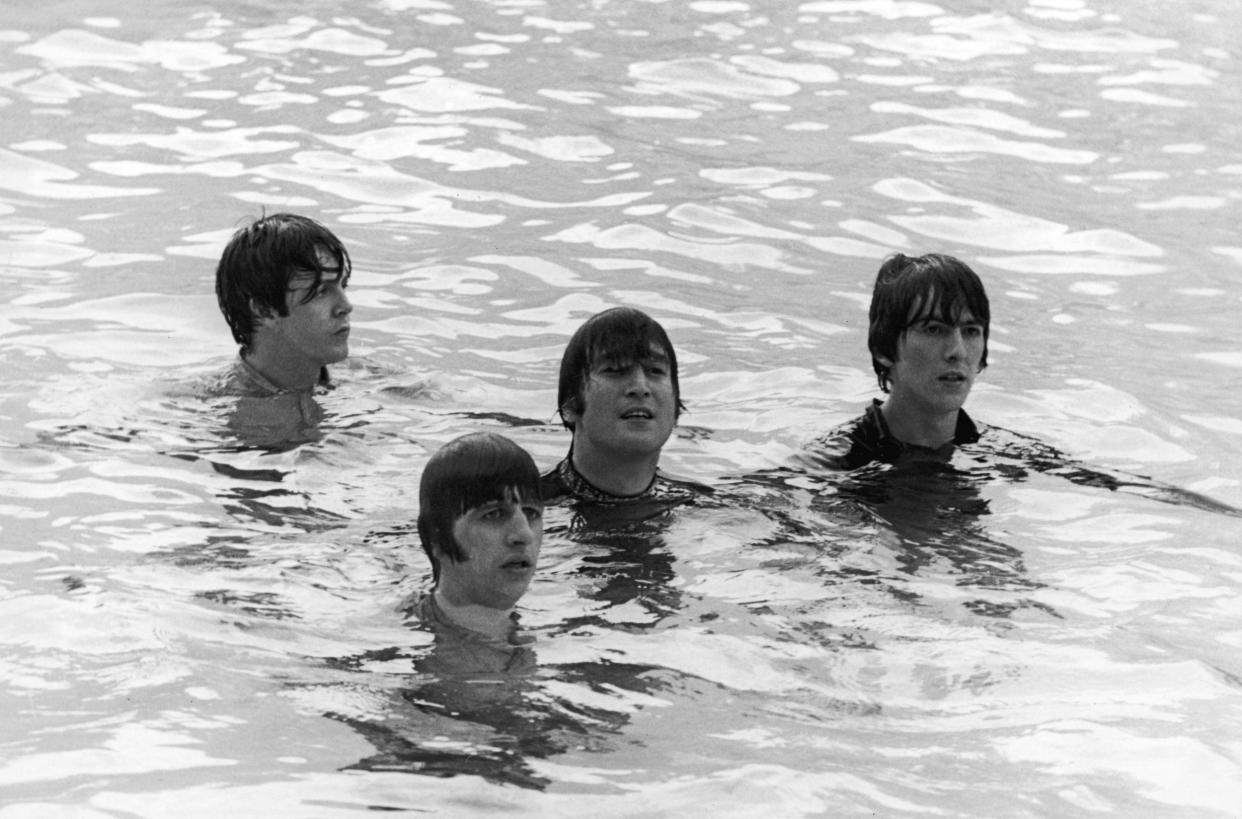 The Beatles tread water in a swimming pool during the filming of their movie, 'Help!,' Nassau Beach Hotel, Nassau, Bahamas, February 26, 1965: Getty