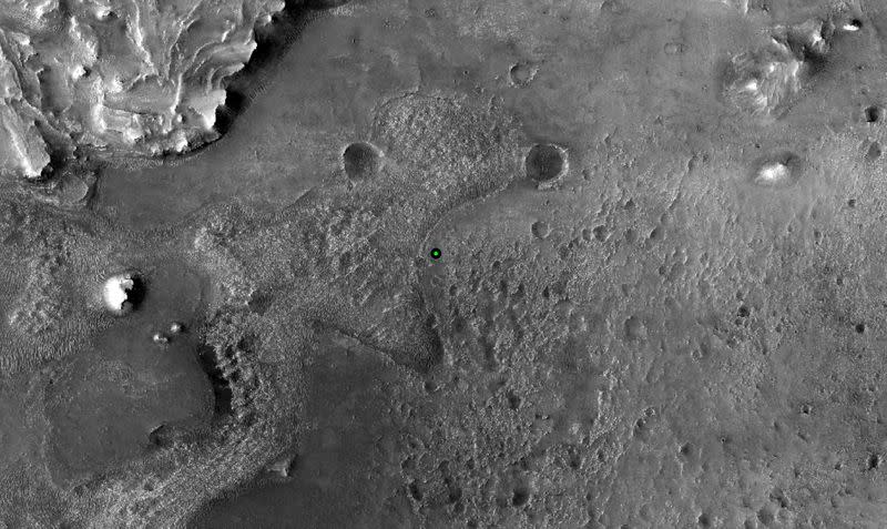 A green dot marks where NASA’s Perseverance Mars rover landed in Jezero Crater on Mars