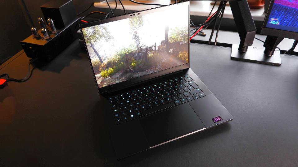 Razer Blade 14 gaming laptop on a desk.