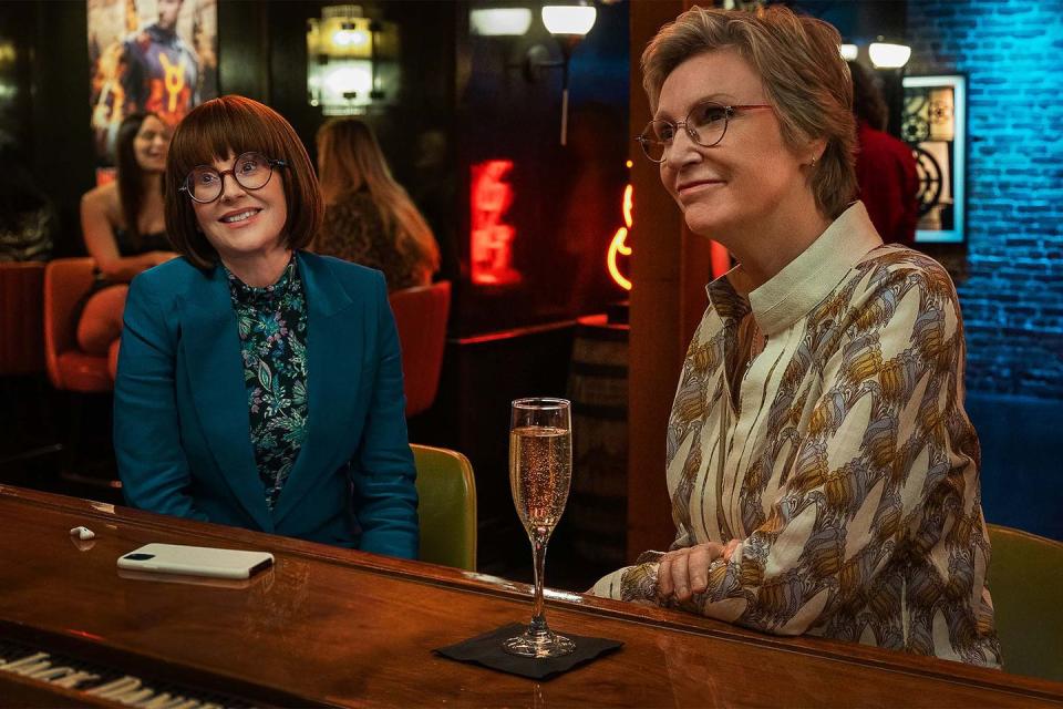 megan mullally as lydia and jane lynch as constance at the bar in a scene from party down scene 3