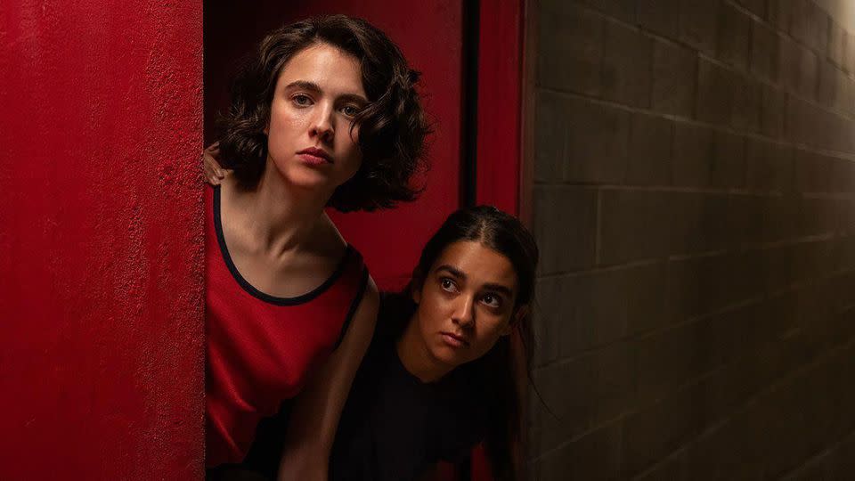 Margaret Qualley and Geraldine Viswanathan co-star in Ethan Coen's and Tricia Cooke's latest film, "Drive-Away Dolls." - From Focus Features