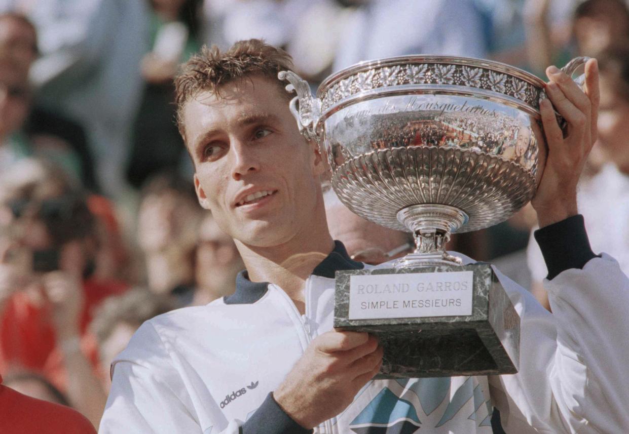 Ivan Lendl with the 1986 French Open championship trophy.