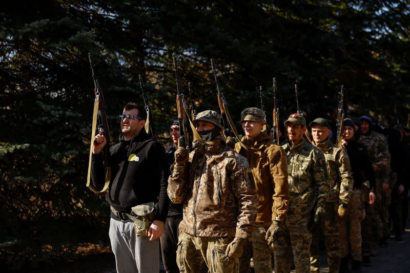 Potential recruits who aspire to join the 3rd Separate Assault Brigade of the Ukrainian Armed Forces take part in a testing basic military course in Kyiv