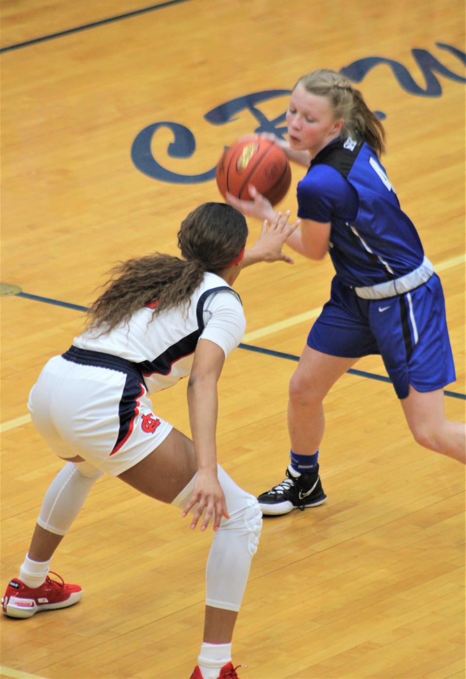 Simon Kenton's Brynli Pernell (right) leads the Lady Pioneers this season, averaging 18 points per game.