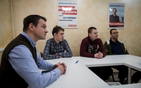 Navalny activists discuss police harrassment in Pskov, a city near Veliky Novgorod - Credit: Dmitri Beliakov/For The Telegraph